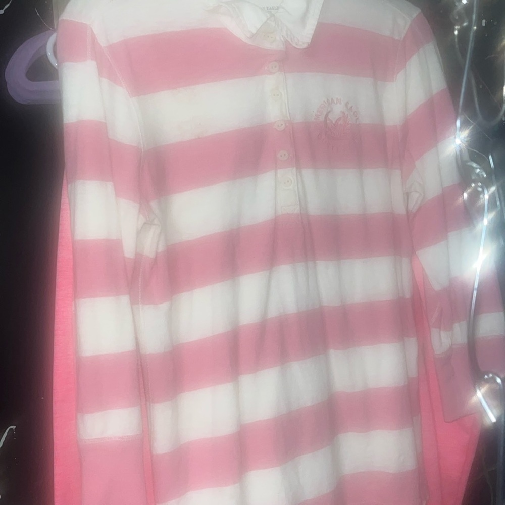 I have a pink 3/4 length sleeves American Eagle collared shirt